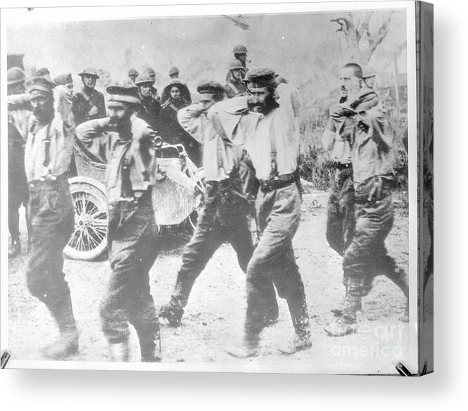 People Acrylic Print featuring the photograph German Pows Are Marched To Prison Camps by Bettmann