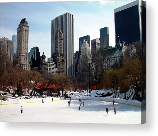 Recreational Pursuit Acrylic Print featuring the photograph Ice Skaters At Central Park by Tbabasade