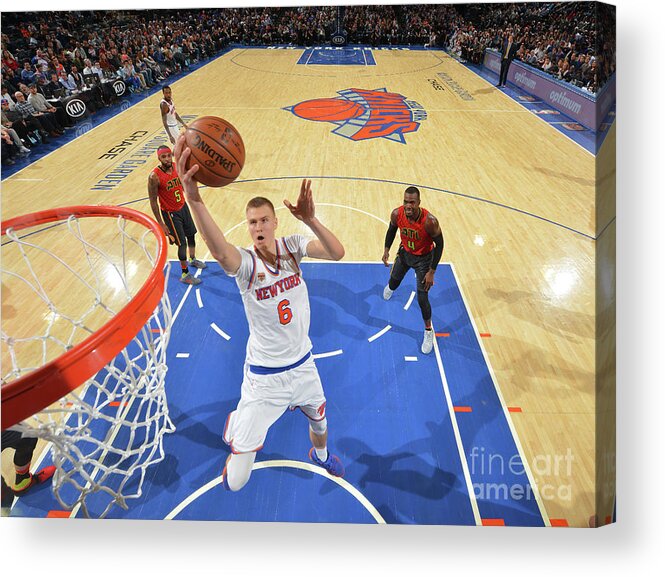 Kristaps Porzingis Acrylic Print featuring the photograph New York Knicks V Atlanta Hawks by Jesse D. Garrabrant