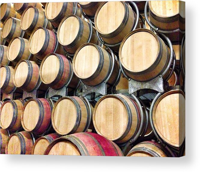 In A Row Acrylic Print featuring the photograph Wine Barrels In Cellar by Hide