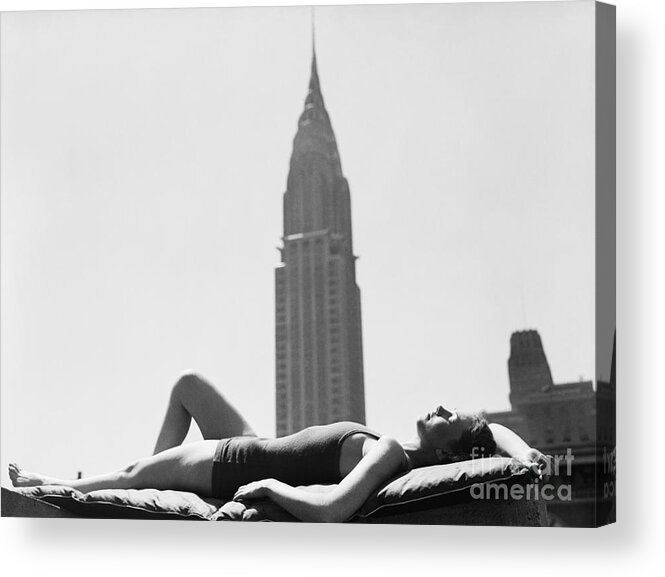 People Acrylic Print featuring the photograph Woman Sun Bathing In Manhattan by Bettmann