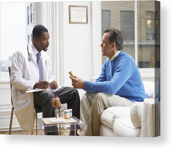 White People Acrylic Print featuring the photograph Doctor Discussing Medicine in His Clinic With a Patient #1 by Digital Vision.