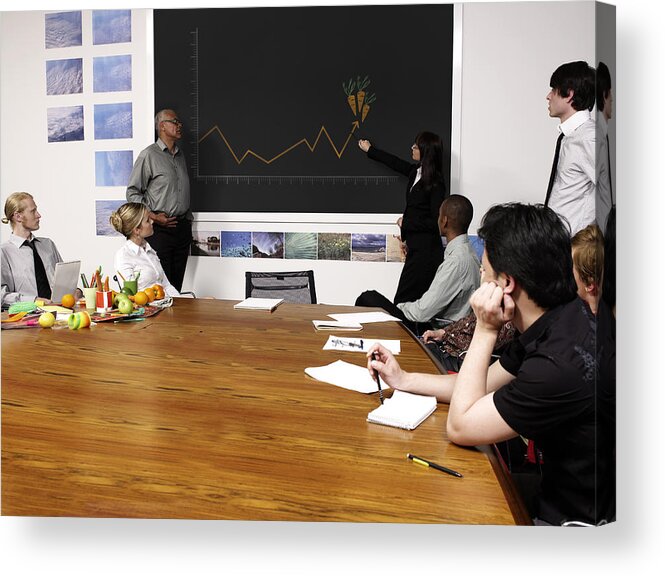 Young Men Acrylic Print featuring the photograph Woman Pointing At Growth Chart Of Carrots by Patrick Ryan