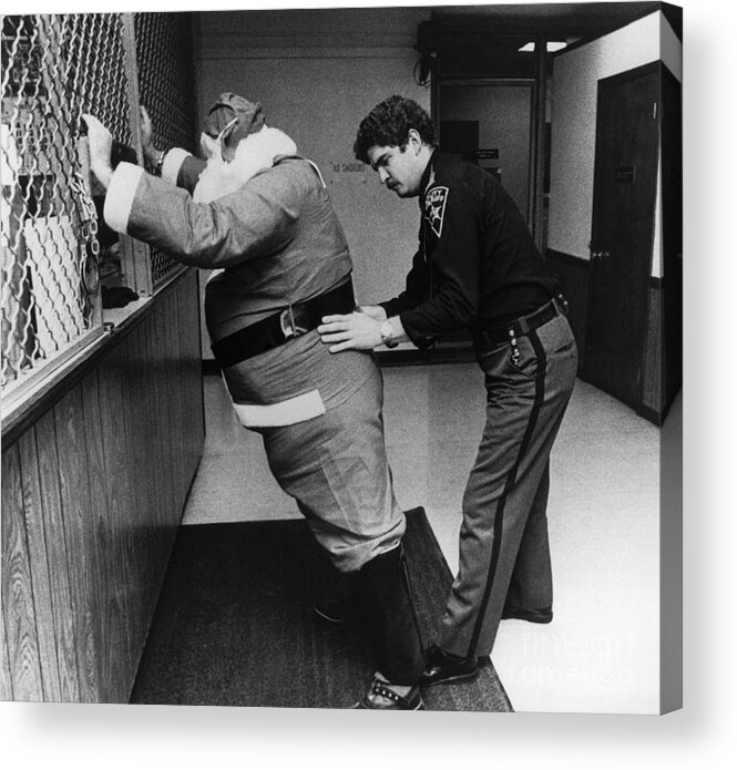 People Acrylic Print featuring the photograph Sheriff Frisking Santa Claus by Bettmann