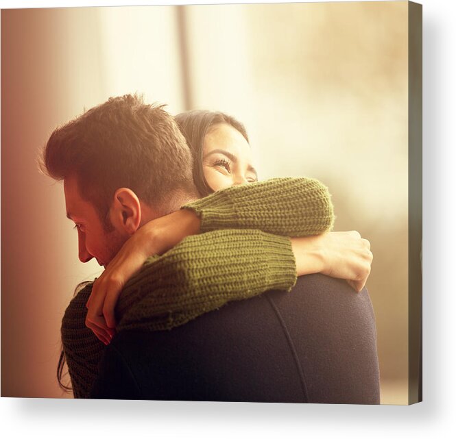 Young Men Acrylic Print featuring the photograph Young Couple Embracing by Graphixel