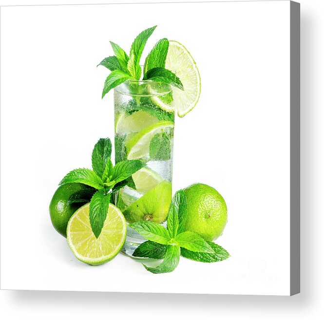 Mojito Acrylic Print featuring the photograph Mojito cocktail with ice isolated over white background. by Jelena Jovanovic