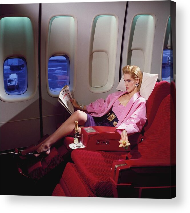 Indoors Acrylic Print featuring the photograph Model Wearing Pink Jacket On Airplane by Horst P. Horst