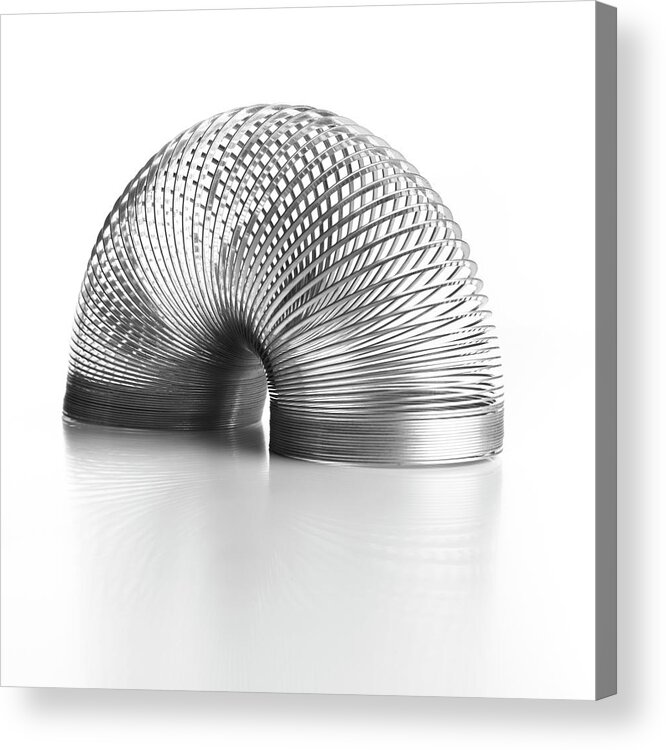 Slinky Acrylic Print featuring the photograph Slinky Spring #1 by Science Photo Library