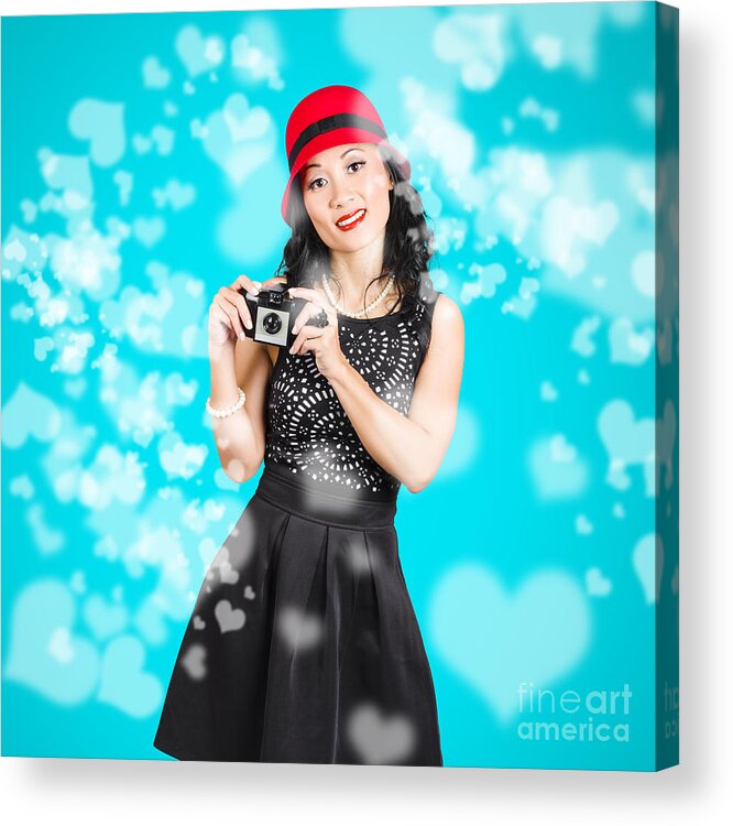 Camera Acrylic Print featuring the photograph Young woman holding retro camera on blue #1 by Jorgo Photography