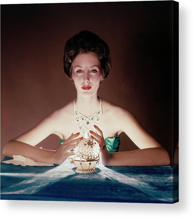 Beauty Acrylic Print featuring the photograph A Model Illuminated By A Faberge Egg by John Rawlings