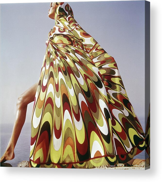 Exterior Fashion Lifestyle Outdoors Daytime Side View One Person People Female Model Young Woman Young Adult Young Adult Woman Lake Tanganyika Colorful Cover-up Emilio Pucci Pucci Africa Posing 1960s Style #condenastvoguephotograph January 1st 1965 Acrylic Print featuring the photograph A Model Posing In A Colorful Cover-up by Henry Clarke