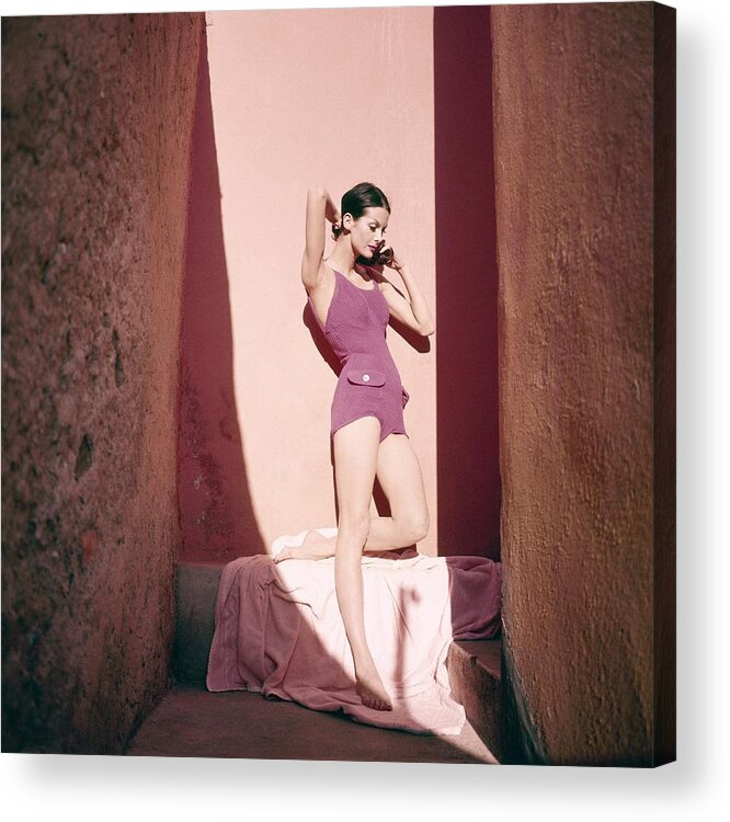 Fashion Acrylic Print featuring the photograph A Model Wearing A Purple Bathing Suit by Tom Palumbo