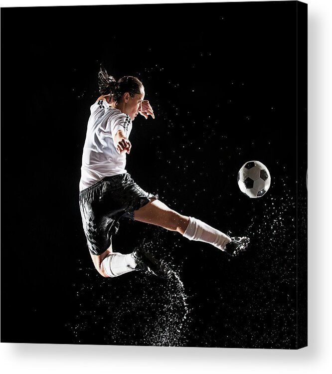Soccer Uniform Acrylic Print featuring the photograph Hispanic Soccer Player Splashing In by Erik Isakson