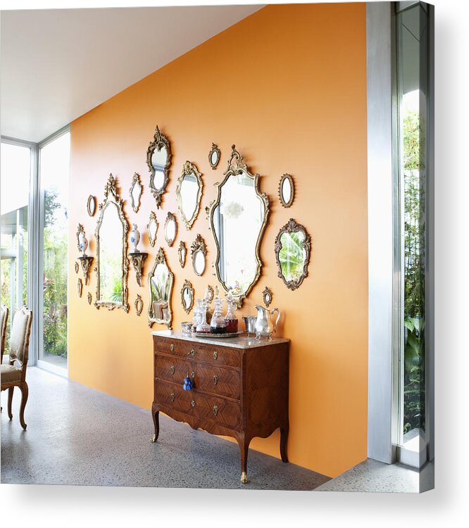 Hanging Acrylic Print featuring the photograph Mirrors on orange wall by Robert Nicholas