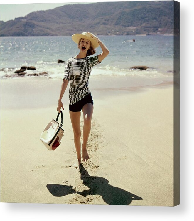 Accessories Acrylic Print featuring the photograph Model Wearing A Straw Hat On A Beach by Sante Forlano