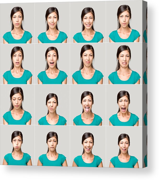 People Acrylic Print featuring the photograph Young woman making facial expressions by Ozgurdonmaz