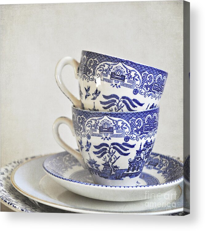 Cups Acrylic Print featuring the photograph Blue and white stacked china. by Lyn Randle