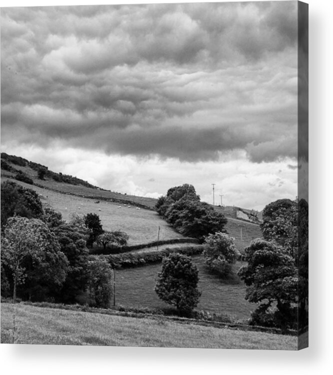 Acrylic Print featuring the photograph The Rolling Hills And Looming Clouds by Aleck Cartwright
