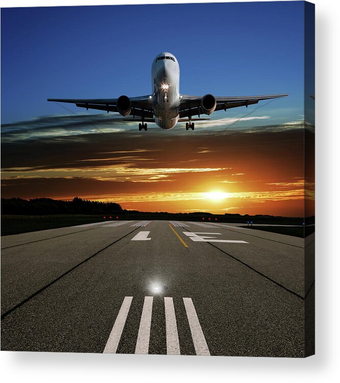 Orange Color Acrylic Print featuring the photograph Xl Jet Airplane Landing At Sunset #1 by Sharply done