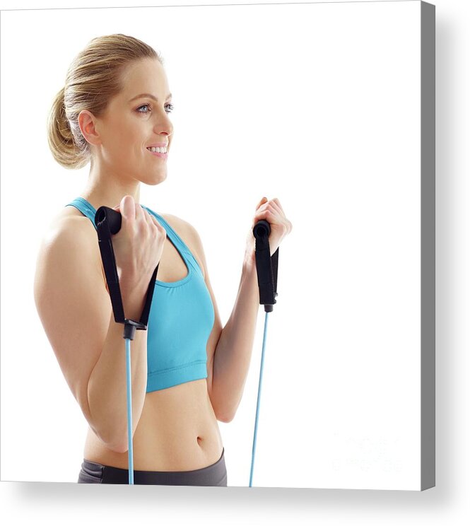 One Person Acrylic Print featuring the photograph Woman Using Resistance Band #2 by Science Photo Library