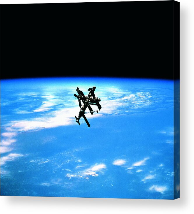 Research Acrylic Print featuring the photograph A Space Station In Orbit Above Earth by Stockbyte