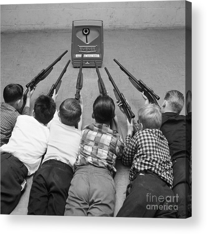 Rifle Acrylic Print featuring the photograph Children Playing With Toy Gun Set by Bettmann