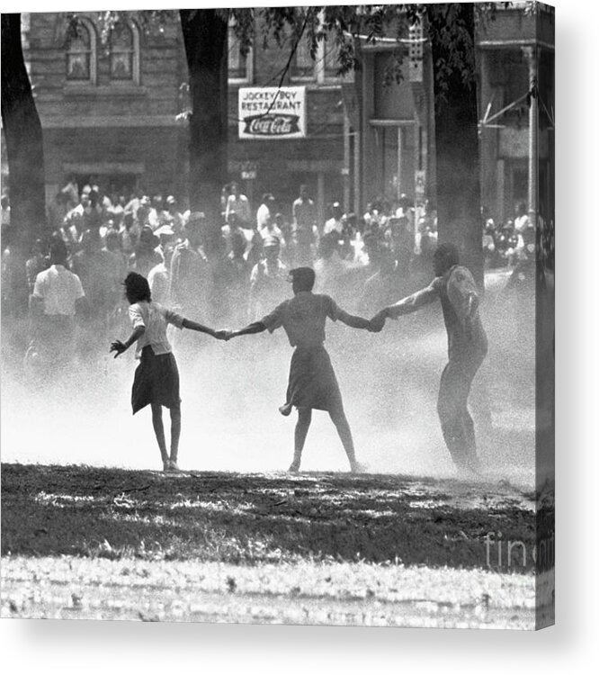 Mid Adult Women Acrylic Print featuring the photograph Demonstrators Facing Fire Hoses by Bettmann