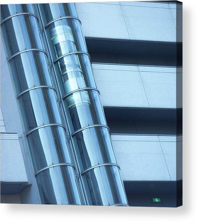 Elevator Acrylic Print featuring the photograph Elevator Moving In Transparent Tube In by Mixa
