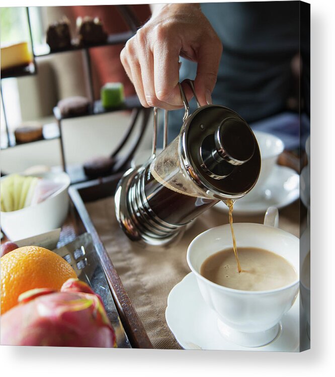 Breakfast Acrylic Print featuring the photograph Man Pouring Coffee Into A Cup From A by Keith Levit / Design Pics