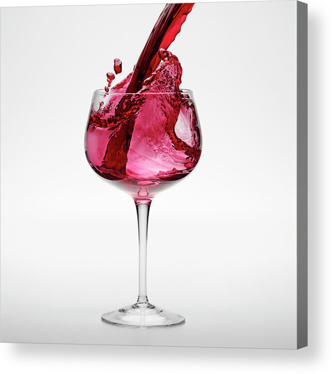 White Background Acrylic Print featuring the photograph Red Wine Being Poured Into Wineglass by Don Farrall