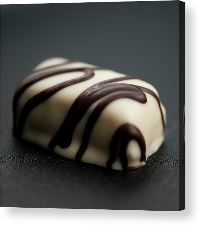 Unhealthy Eating Acrylic Print featuring the photograph White Chocolate Praline by Christina Børding