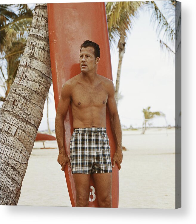 Three Quarter Length Acrylic Print featuring the photograph Young Man Holding Surfboard On Beach by Tom Kelley Archive