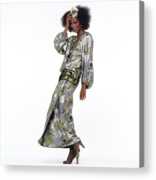 Fashion Acrylic Print featuring the photograph Beverly Johnson Wearing A Silver Saint Laurent Dress by Albert Watson