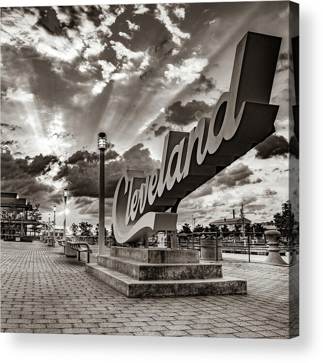 Cleveland Sculpture Acrylic Print featuring the photograph Rays of Light Over The Cleveland Script Sign on North Coast Harbor - Sepia by Gregory Ballos