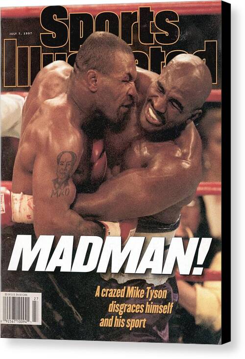 Magazine Cover Canvas Print featuring the photograph Mike Tyson Vs Evander Holyfield, 1997 Wba Heavyweight Title Sports Illustrated Cover by Sports Illustrated