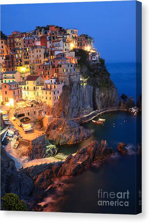Cinque Terre Canvas Print featuring the photograph Manarola at night in the Cinque Terre Italy by Matteo Colombo