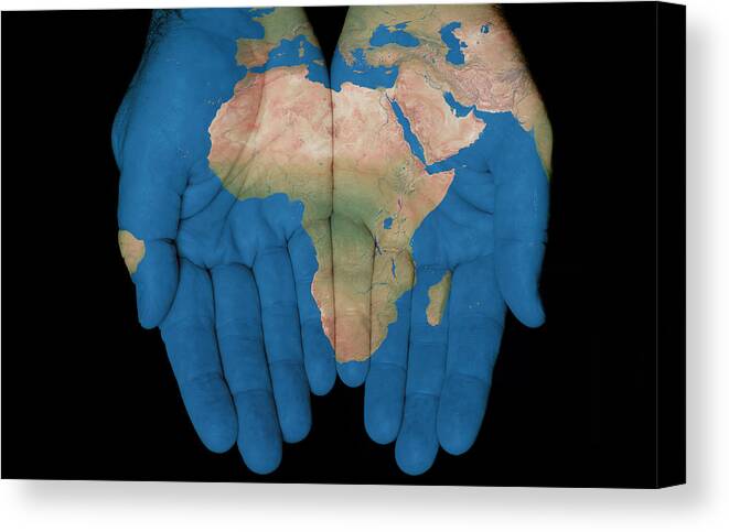 World Map Canvas Print featuring the photograph Africa In Our Hands by Jim Vallee
