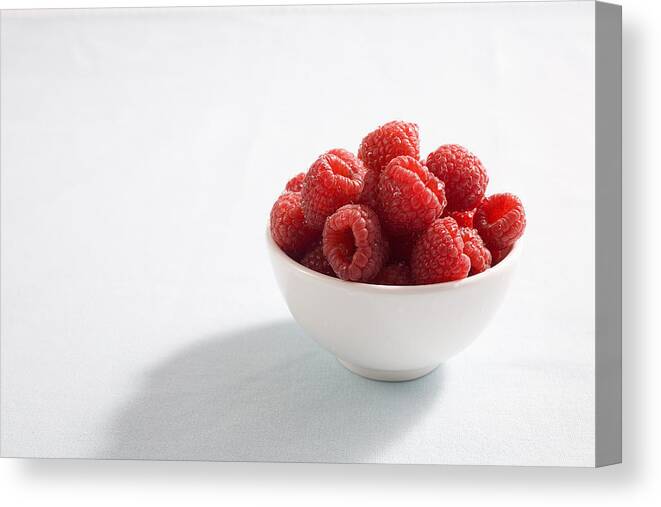 Berry Canvas Print featuring the photograph Bowl Of Raspberries #1 by Greg Huszar Photography