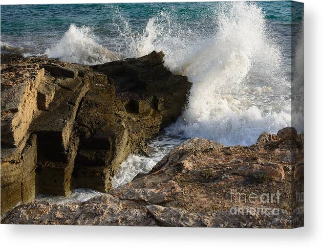 Balearic Canvas Print featuring the photograph Breaking wave in Ses Covetes #1 by Ingela Christina Rahm