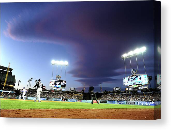 Ball Canvas Print featuring the photograph Colorado Rockies V Los Angeles Dodgers #1 by Harry How