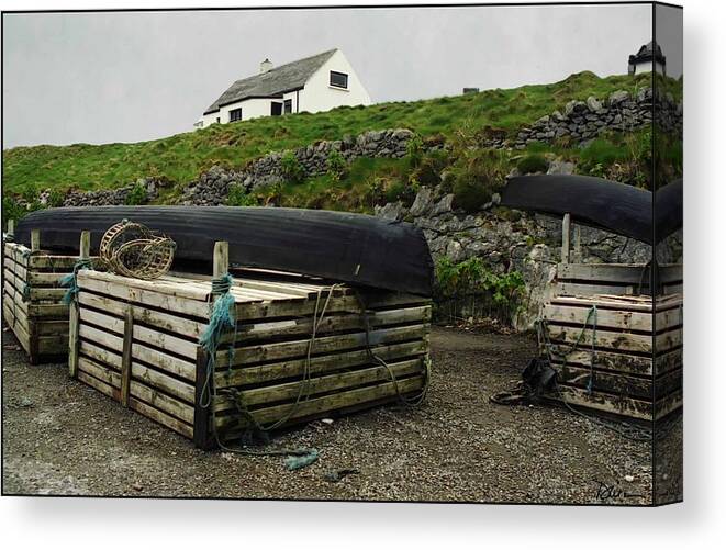 Ireland Canvas Print featuring the photograph Cottage and Currach #1 by Peggy Dietz