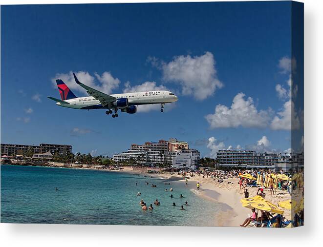 Delta Air Lines Canvas Print featuring the photograph Delta Air Lines landing at St Maarten #1 by David Gleeson