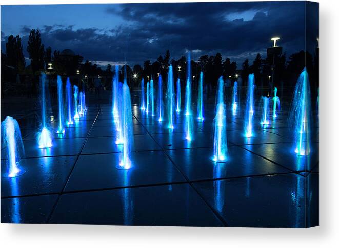 Waving Canvas Print featuring the photograph Fountain Show #1 by Republica