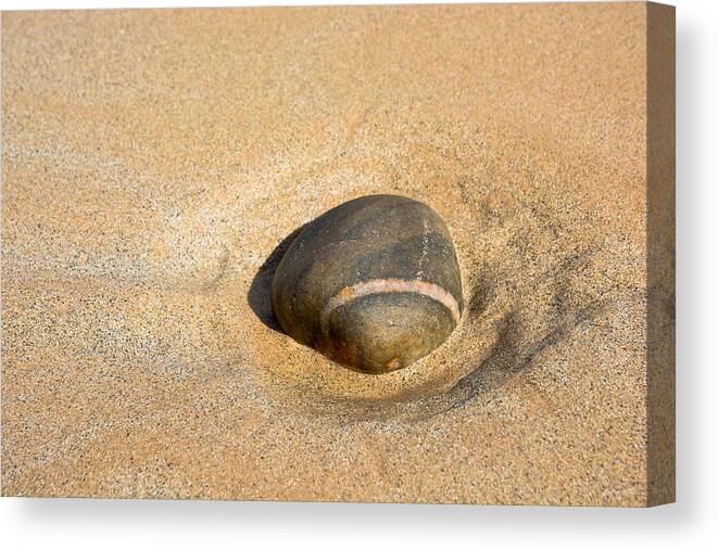 Stone Canvas Print featuring the photograph Solitude At The Beach by Andreas Berthold