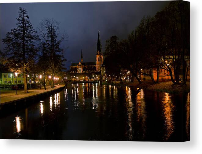 Uppsala By Night Canvas Print featuring the photograph Uppsala by night by Torbjorn Swenelius