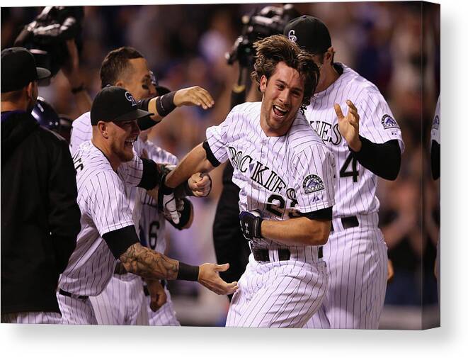 Celebration Canvas Print featuring the photograph New York Mets V Colorado Rockies by Doug Pensinger