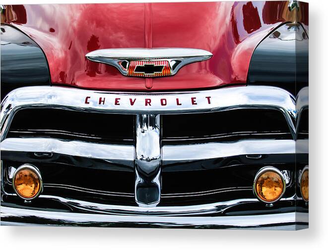 1955 Chevrolet 3100 Pickup Truck Grille Emblem Canvas Print featuring the photograph 1955 Chevrolet 3100 Pickup Truck Grille Emblem #2 by Jill Reger