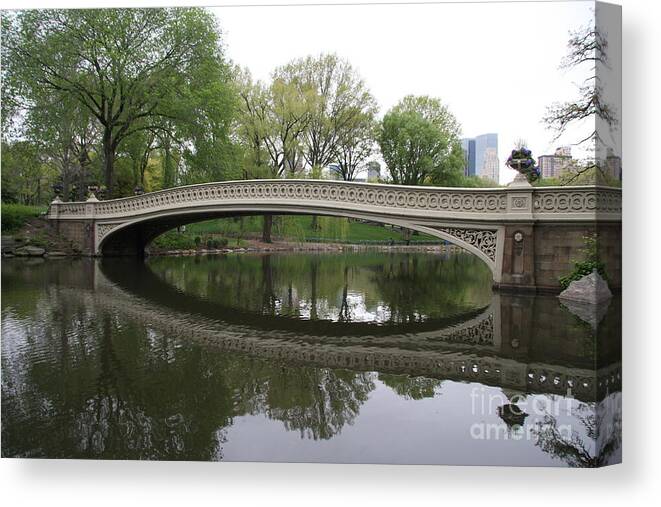 Bow Bridge Canvas Print featuring the photograph Bow Bridge Reflection NYC by Christiane Schulze Art And Photography