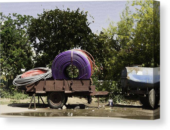 Canon Canvas Print featuring the digital art Coils of thick plastic pipe on a carrier wagon #2 by Ashish Agarwal