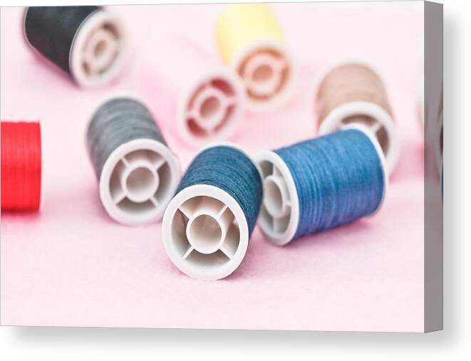 Abstract Canvas Print featuring the photograph Cotton reels #2 by Tom Gowanlock